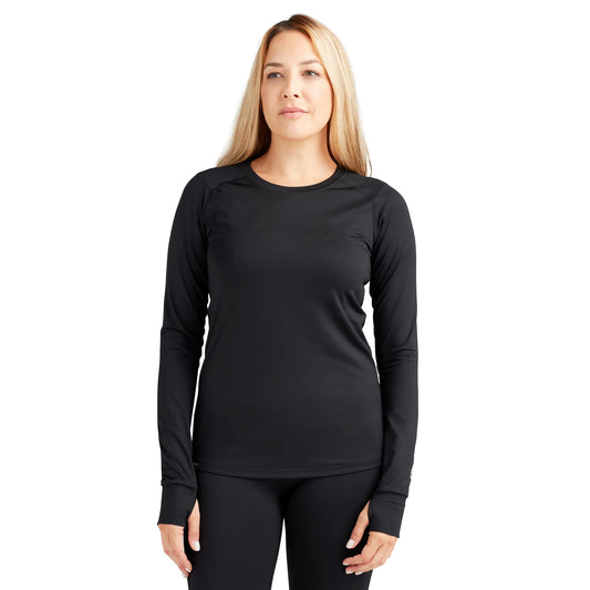 A woman wearing a black long-sleeved Dakine top, which is part of the base layers category.