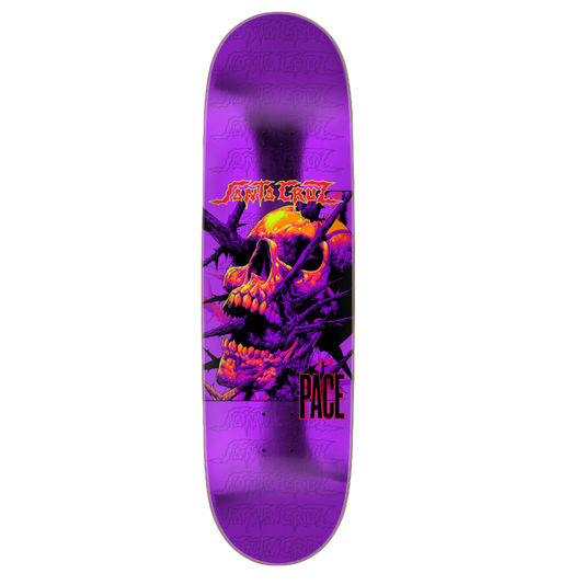 Skateboard deck with a purple and black design featuring a skull and the brand 'Santa Cruz' on a white background.